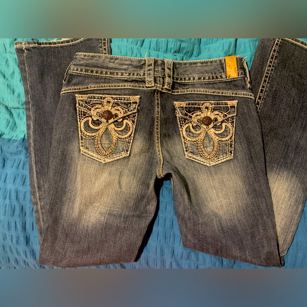 Maurice’s boot cut jeans size 9/10 reg length. Semi stone washed
